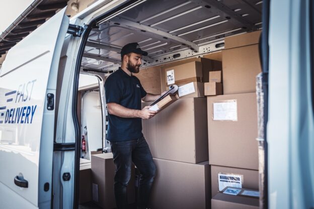 courier driver checking packages